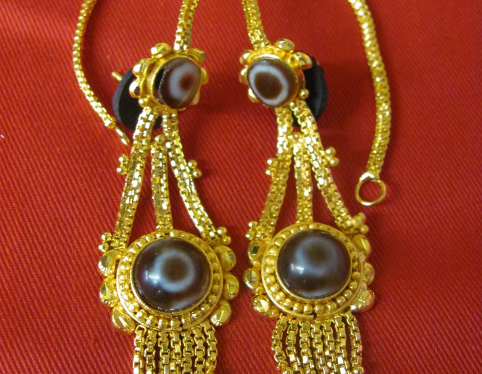 gold costume earrings