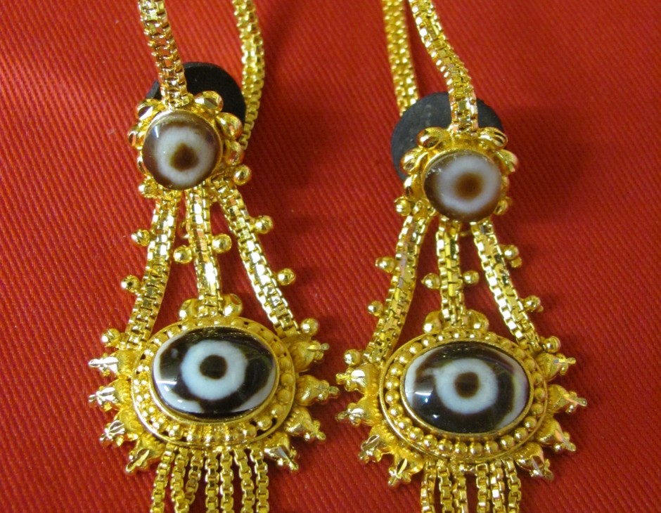 gold costume earrings